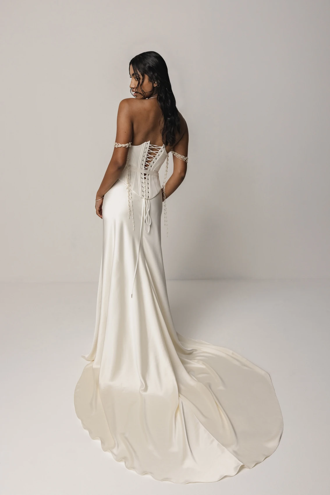 Contemporary corset back bridal gown